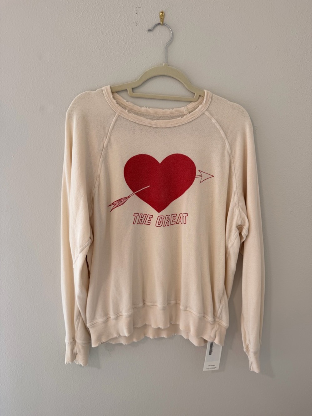 THE GREAT. Cream Crewneck Sweatshirt with Red Heart Graphic